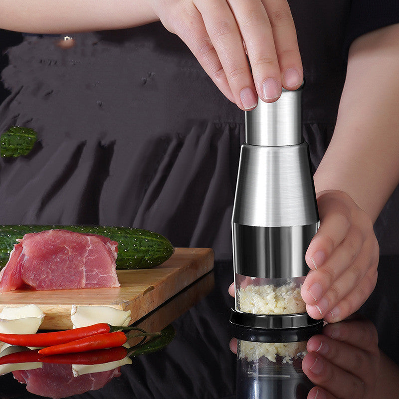 Person using a pepper grinder with a dark background and food items on a cutting board.