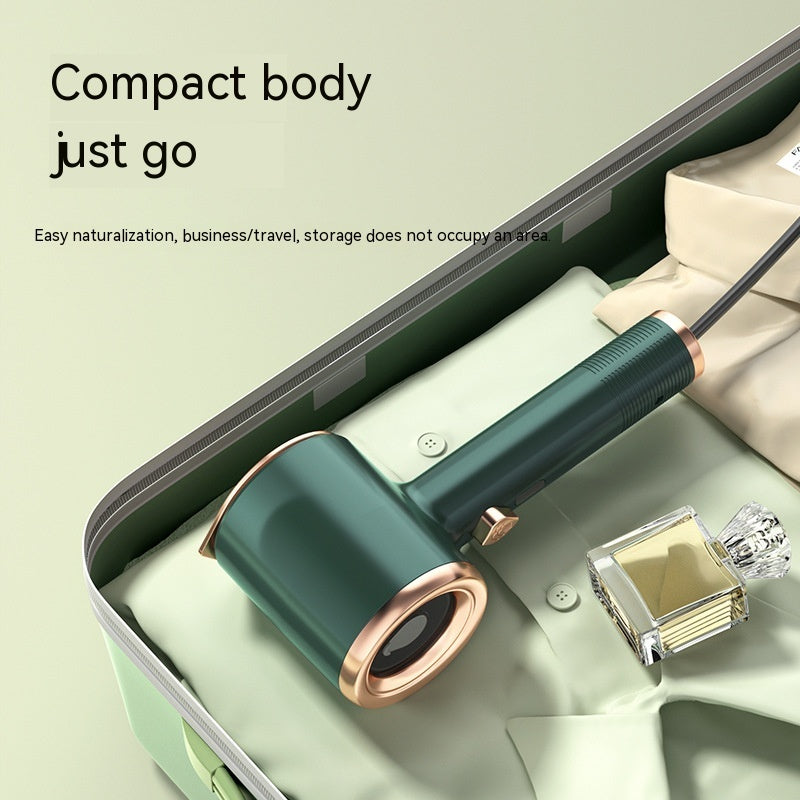 Green and rose gold hair dryer on a light green surface with text about compact design.