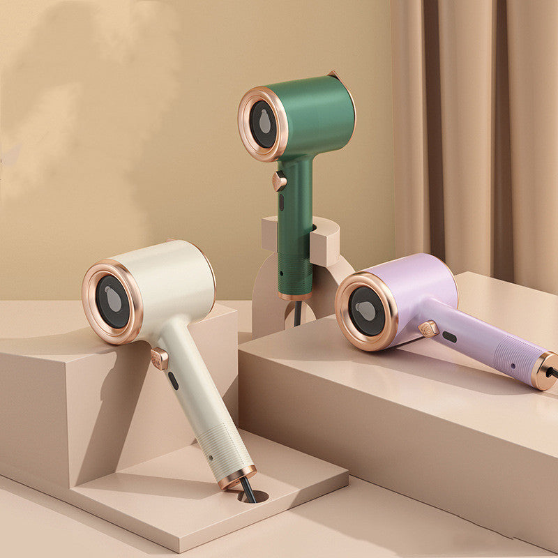 Three hair dryers in white, green, and purple on a beige platform with a neutral background