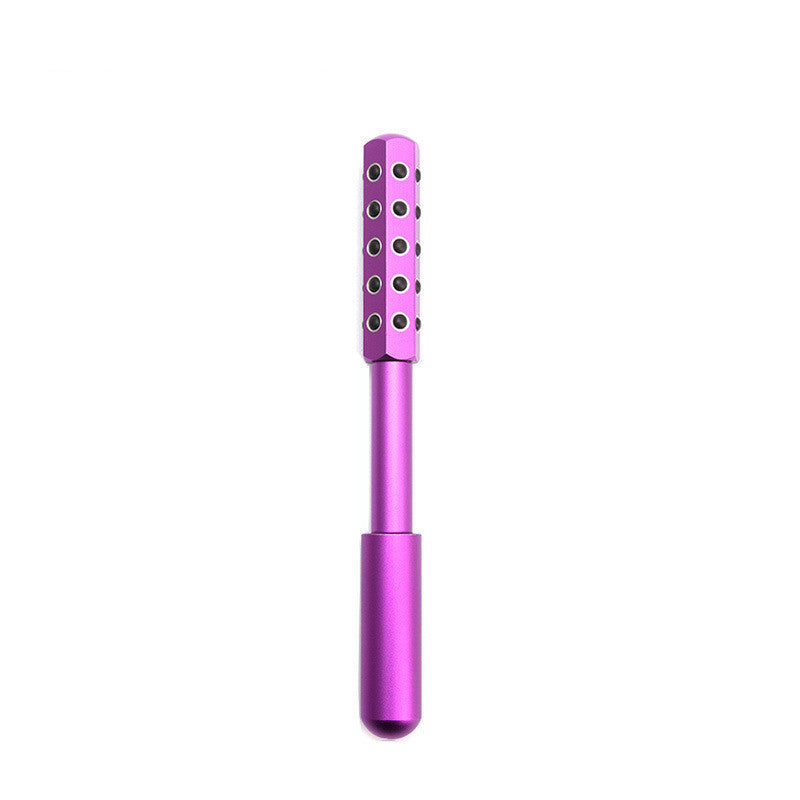 Purple pen-like device with black buttons on a white background