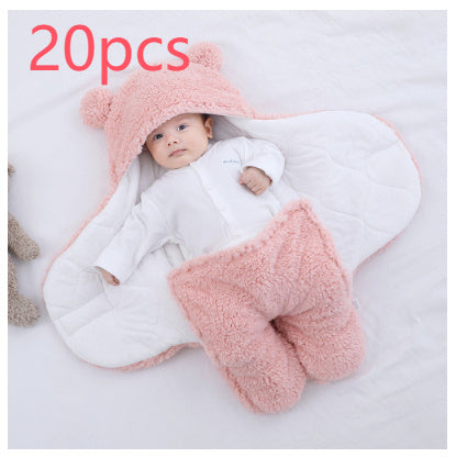 Baby in a pink and white sleeping bag with '20pcs' text above on a light gray background