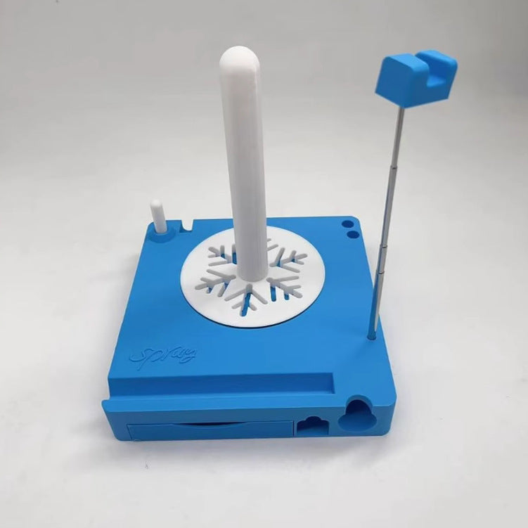 Blue ice cream maker with white handle on a white background