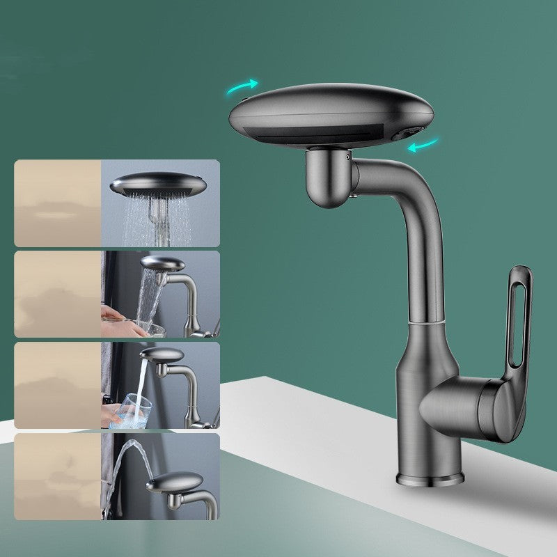 Modern kitchen faucet with shower head on a green background