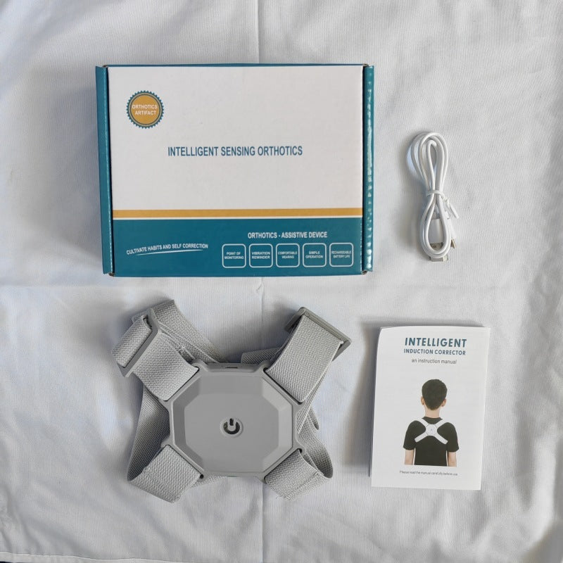 Intelligent sensing orthotics package with device, cable, and user manual on a white background