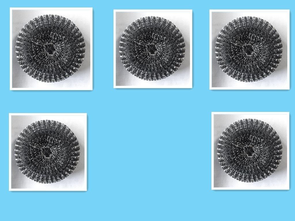 Five black circular objects on a blue background