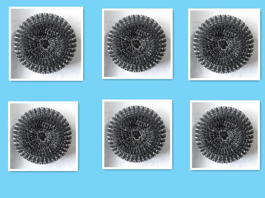 Six black metal scrubbers on white squares against a blue background