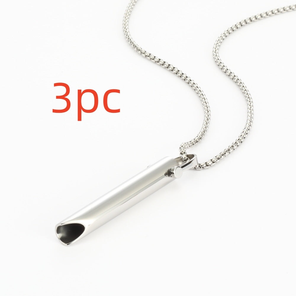 Silver necklace with a cylindrical pendant on a white background