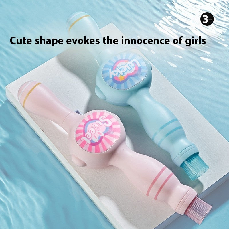 Two children's bath toys, one pink and one blue, on a white tray with water splashes in the background.