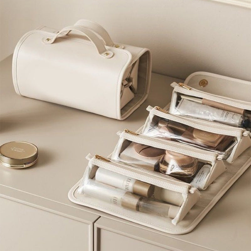 Beige makeup organizer with cosmetics on a light surface