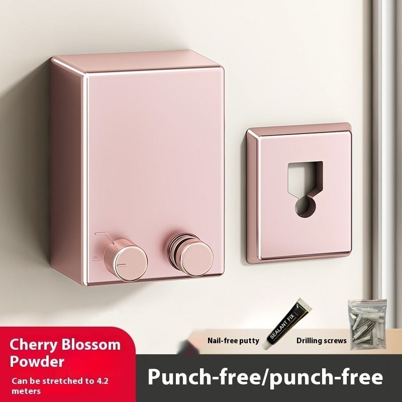 Pink wall-mounted lock system with cherry blossom powder finish on a neutral background