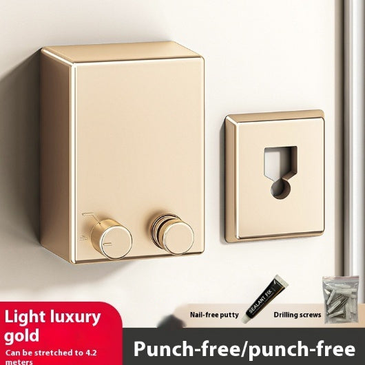 Gold light switch and cover plate on a white wall with text about material and features.
