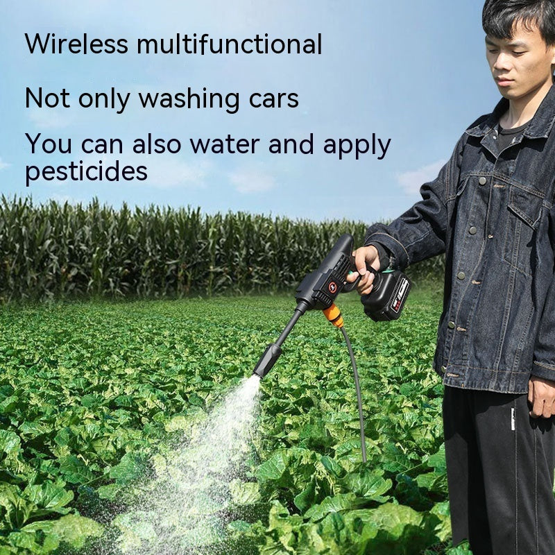 Person using a wireless multifunctional device to water plants in a field.