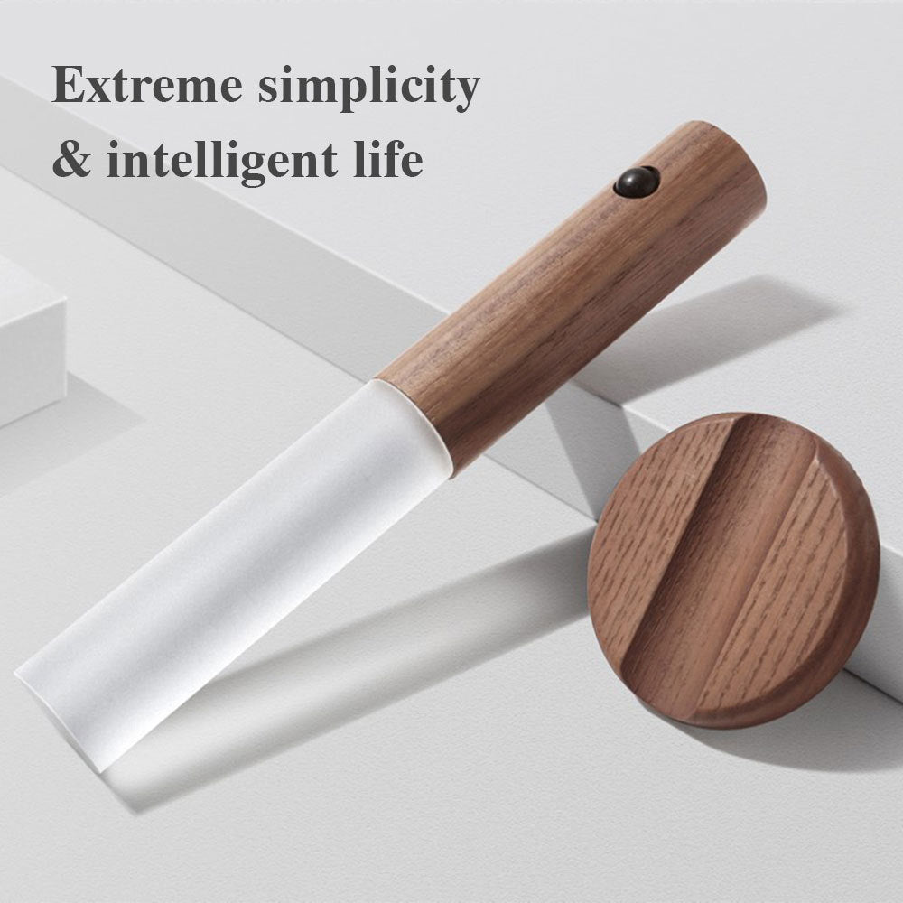 Wooden tool with a white blade on a light gray background, featuring text 'Extreme simplicity & intelligent life'.